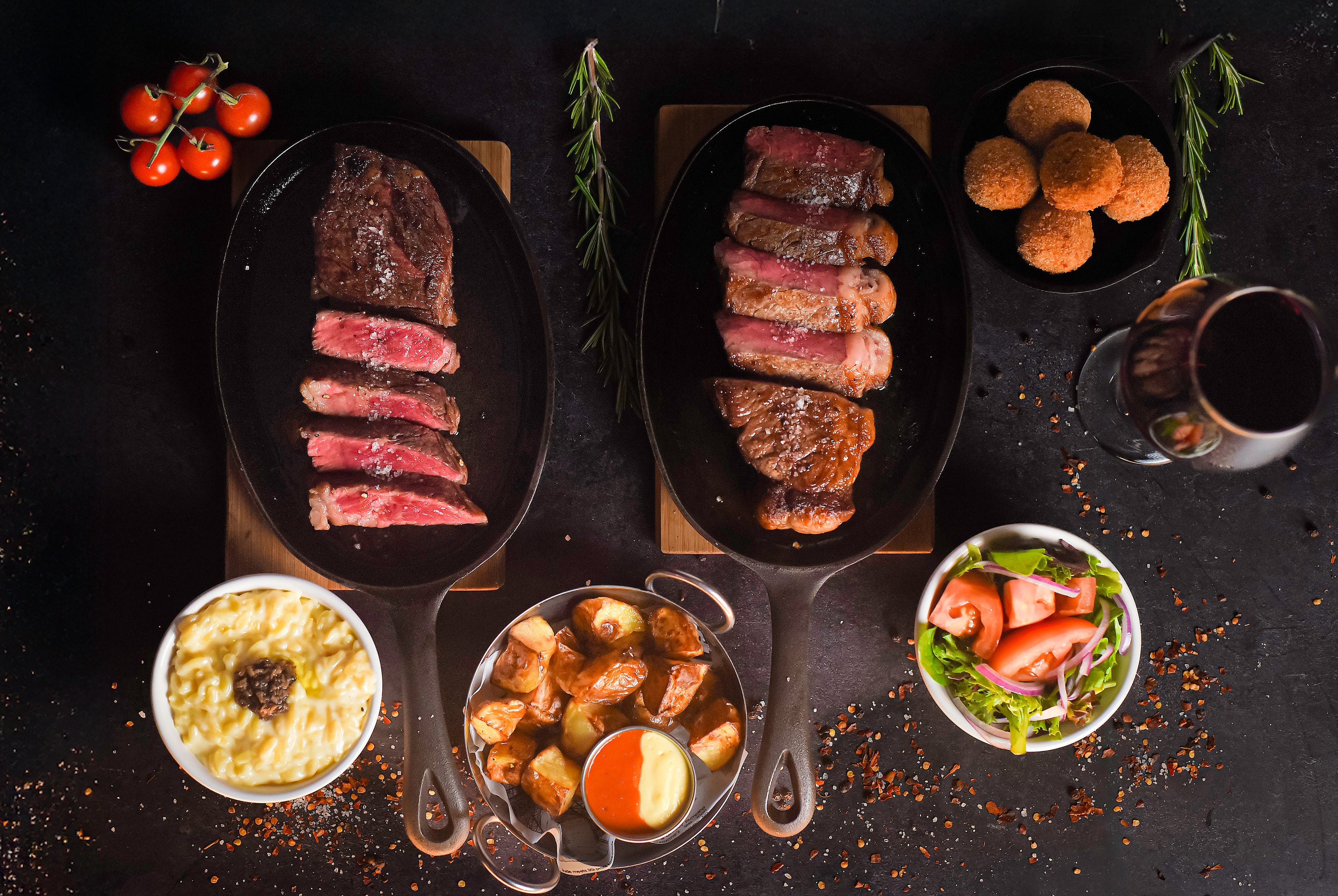 La Wagyeria Austin exterior view at night with warm lights and sign